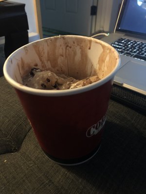 32oz container of ice cream, less than 3/4th full.