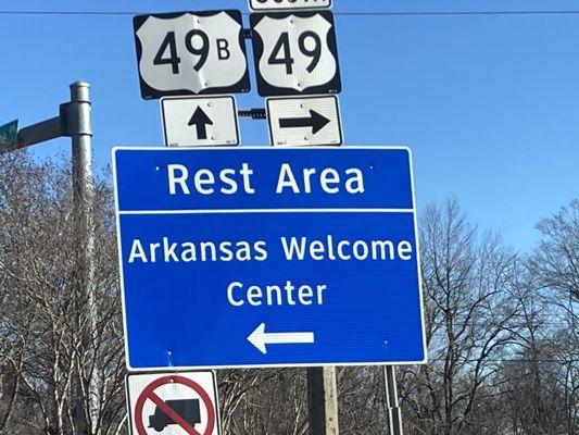 roadway signage indicating the location of Helena - West Helena Arkansas Welcome Center