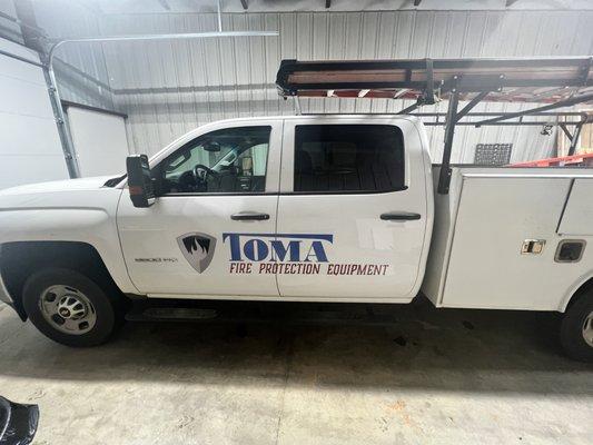 Truck lettering for local business Toma Fire