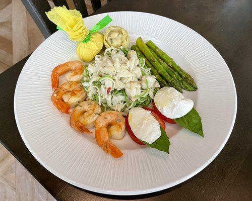 Della Casa salad: chilled homemade angel hair pasta, lump crab, marinated Gulf shrimp, caprese, asparagus