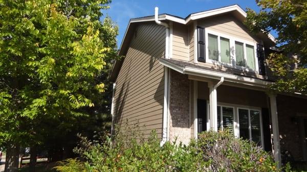 The front of the home after the new Amerimax Windows, James Hardie Siding, Certainteed Roofing, Gutters