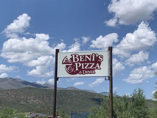 Beni's Pizza and Diner sign next to the open parking