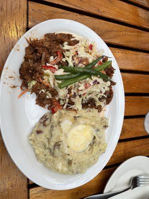 Pulled pork dinner with garlic mashed potatoes.