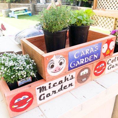 Every spring we grow a school garden that we get to watch our veggies and fruits grow! These were hand painted by one of our teachers.