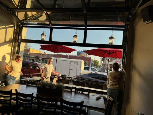 They have one of those cool roll up windows.  Oh, the patio is dog friendly!!! They even set out a bowl of water.