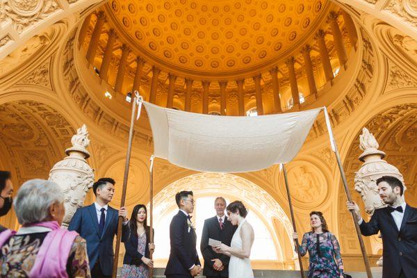 Wedding Chuppah under the gold dome at San Francisco City Hall