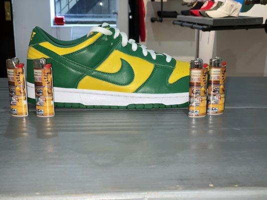 Brazil dunks size 11.5 and vaticfinery bic lighter available at store.