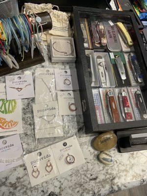 Cute selection of jewelry and niceeee knives.