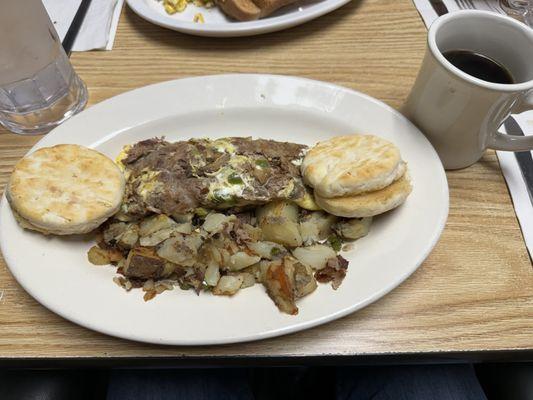 Steak omelette with biscuits and potatoes