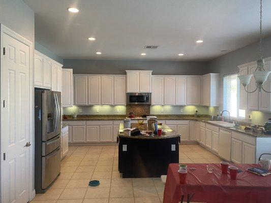 Fresh white cabinets & grey walls.