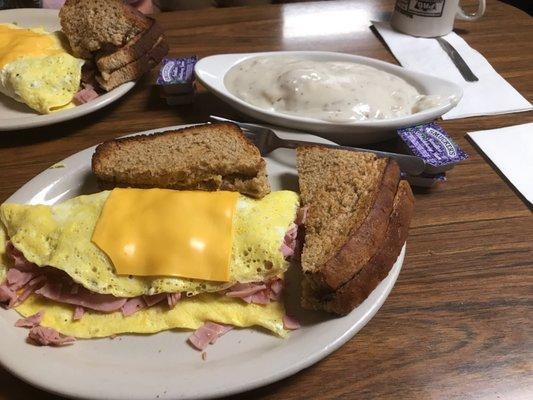 Ham and cheese omelette with a half order of biscuits and gravy