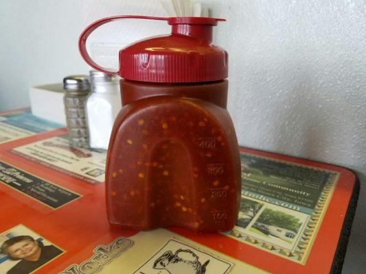 The bottle of hot sauce they keep on the tables