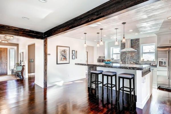 Beautiful, light and airy kitchen is waiting for you to throw your next party.