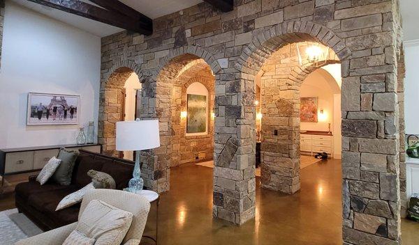 Interior remodel
 Stone wall finish on this kitchen and arches.