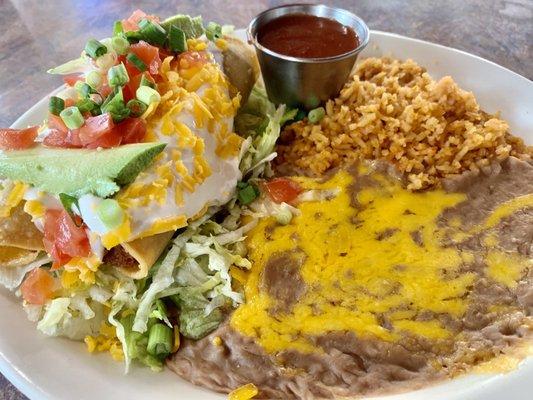 Chicken taquitos with side of rice and beans