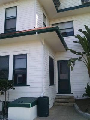 Perfect match - green gutter, white down spout and my rain barrel!