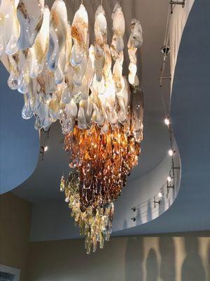 "Dolce"  Commission installation with 252 blown glass pieces hanging in an 18' long curve