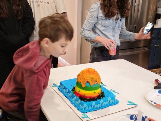 Rainbow volcano ,that spills M&Ms when you cut into it, made this 6-year-old very happy!