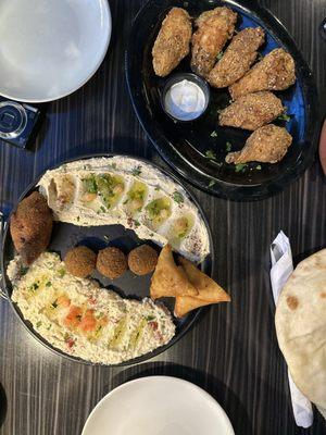 Hummus sampler and wings