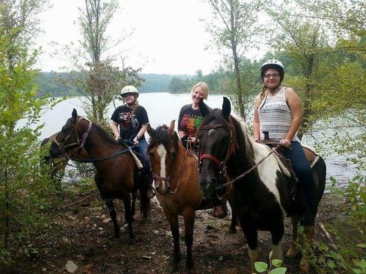 Trail riders stopping for a photo and a drink