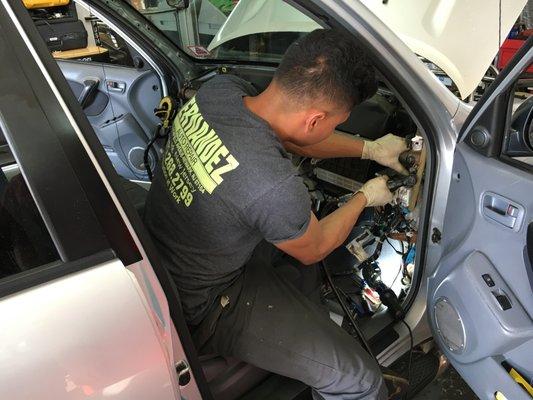 One of our technicians working on replacing the A/C evaporator with heater core. This job took about 8-10 hours, but it was back to normal!