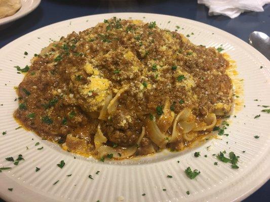 Homemade fettuccine with bolognese.