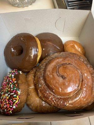 Cinnamon, chocolate covered, chocolate custard filled, cake donut with sprinkles, cronut, glazed twist.