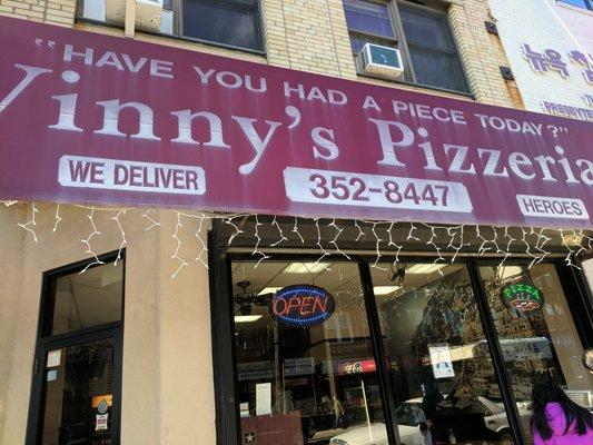 Storefront of Vinny's Pizzeria