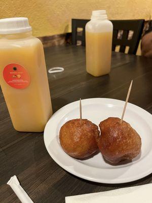 Puff puffs with mango and passion fruit juice.