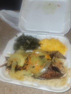 Red Snapper cooked & seasoned to perfection over rice with collard greens and Macaroni