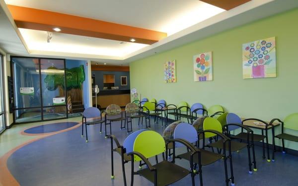 This is our lobby with the glassed in active play area for the kids.