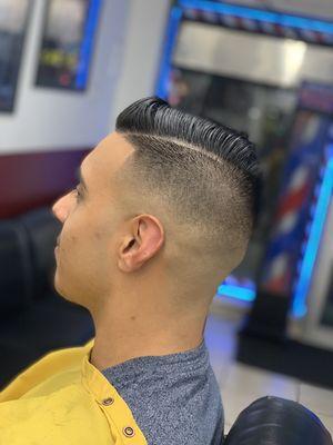 Haircut done by David, mid-fade