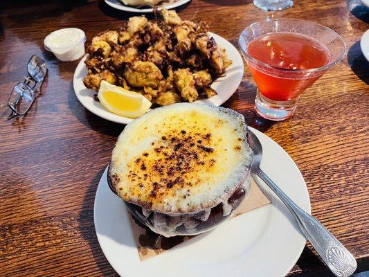 French onion soup, artichoke appetizer, cosmopolitan cocktail