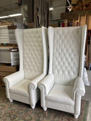 Reupholstered with vinyl tufted chairs