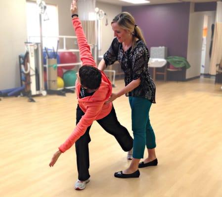 Clinic Director, LaRissa Shaps, working with her breast cancer physical therapy patient.