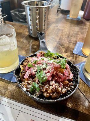 Fantastic Frito pie, try adding the house made hot sauce!