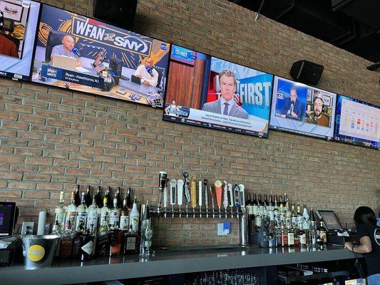 A seat at the bar and plenty of televisions