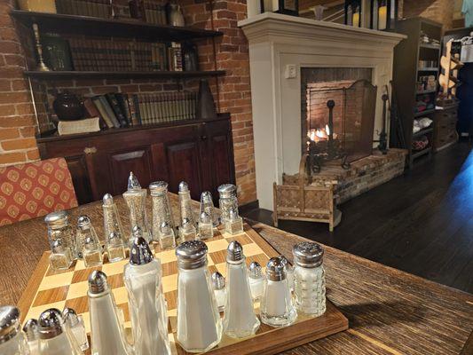 Enjoy a game of salt & pepper Chess by the cozy fireplace!