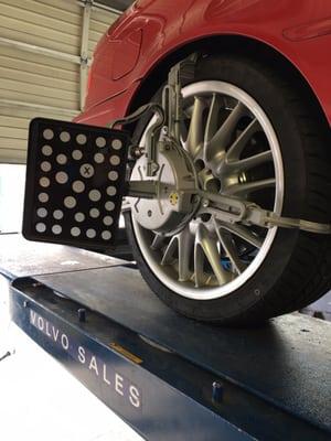 Alignment rig attached to passenger rear. Looks like a weapon :)