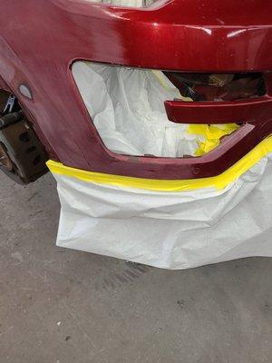 Badly smashed bumper. Repaired by the master