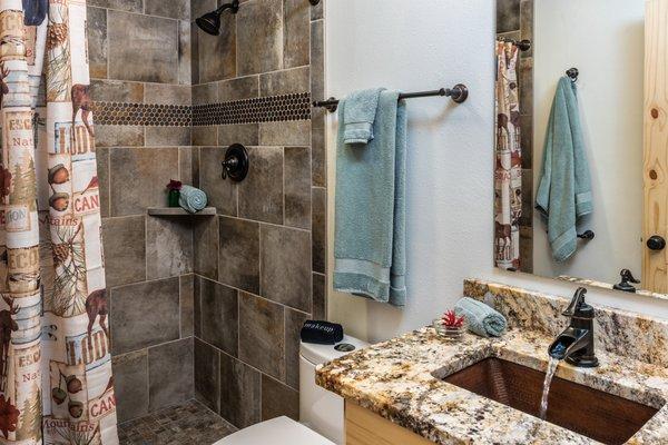 Enjoy the oversized shower in the Sportsman's room.