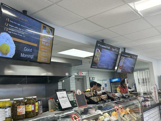 Part of the TV menus and deli cabinets