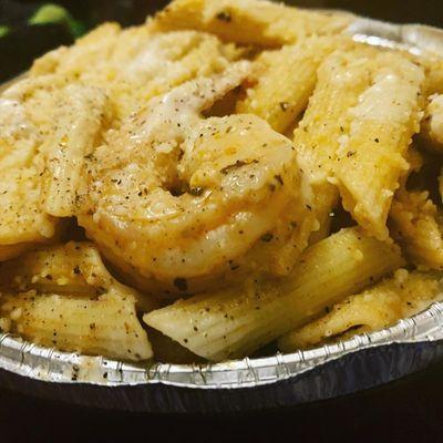 Grilled shrimp pasta. Takes about 15mins of a wait but worth it. Like 6-7 jumbo shrimps. Cheese.