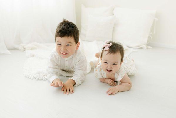 One year old portrait with her brother