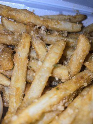 See the generous helping of garlic on these fries.