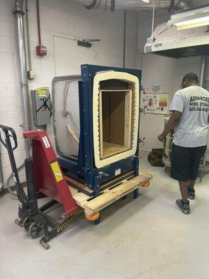 Delivering a kiln into the ceramics lab