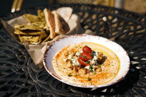 Heavenly Hummus Plate - Shawarma served with hummus and pita.