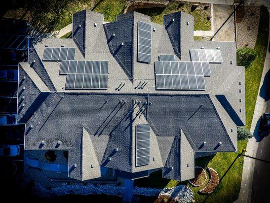 Drone shot, residential rooftop solar.