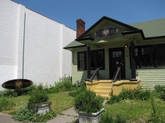 The 1928 Bungalow that houses Mrs. Thompson's. Enjoy the display gardens, come in and stay awhile!