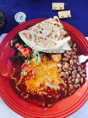 Huevos Rancheros with red chile, home fries and beans.